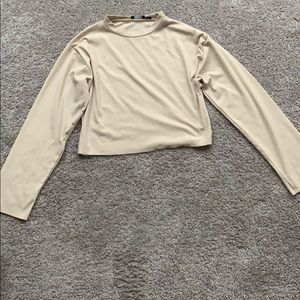 Beige cropped long sleeve shirt